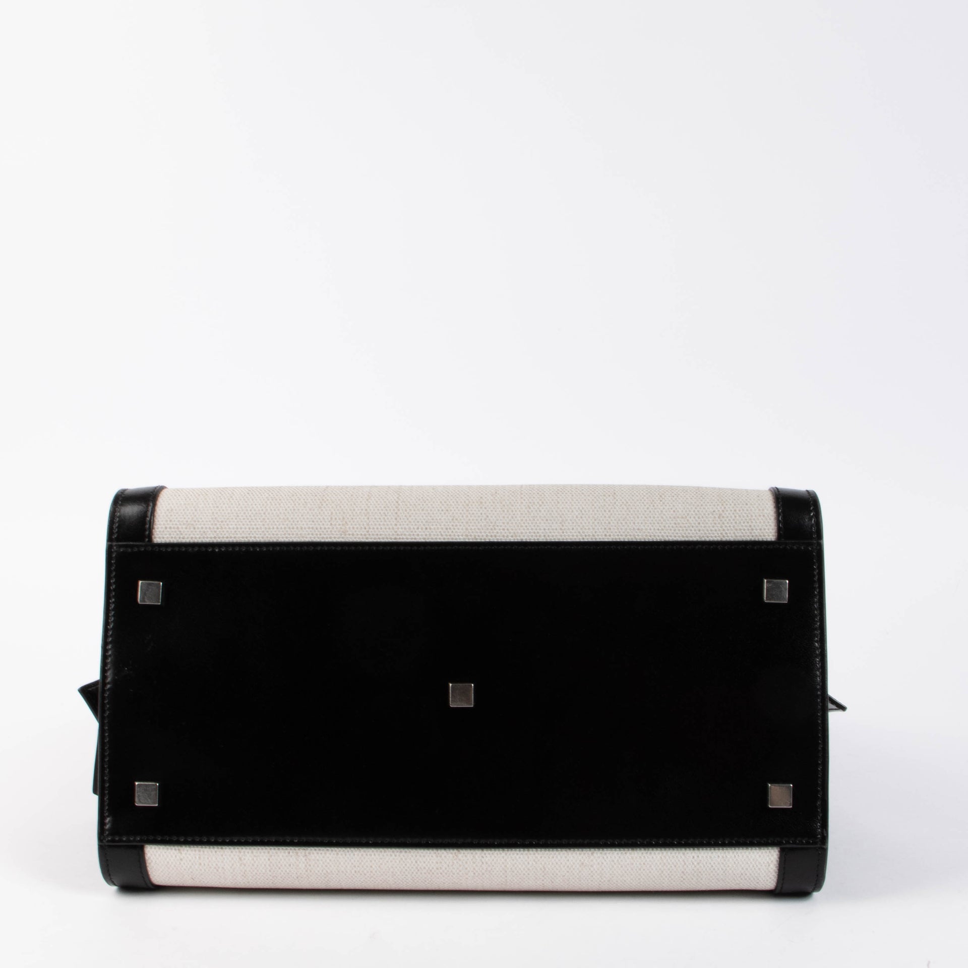 Shop the authentic Saint Laurent Black & White Canvas/Leather Uptown Tote Bag second hand on Labellov.com