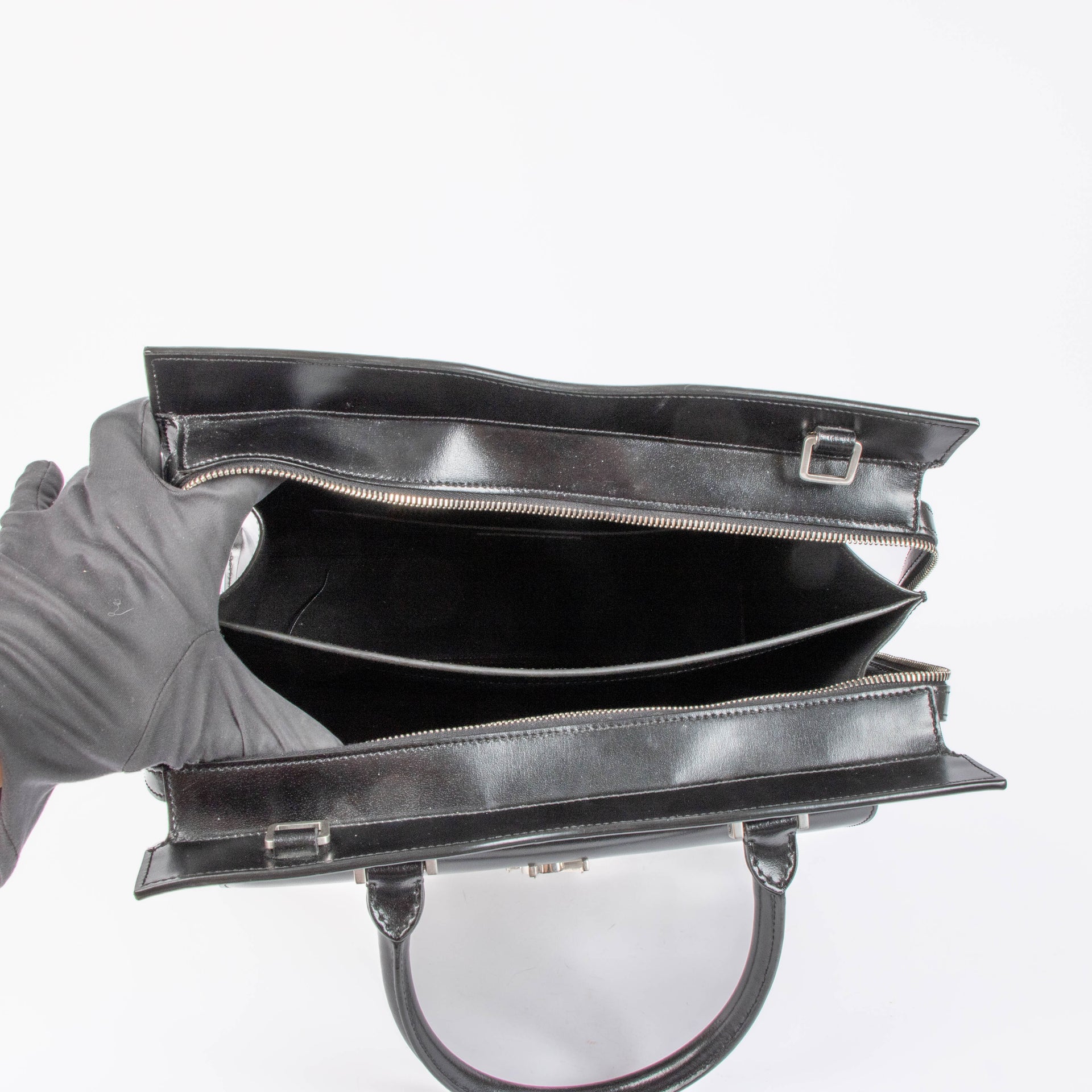 Shop the authentic Saint Laurent Black & White Canvas/Leather Uptown Tote Bag second hand on Labellov.com