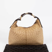 Shop this 100% authentic Gucci Beige Ostrich Small Horsebit Hobo Bag at Labellov.com.