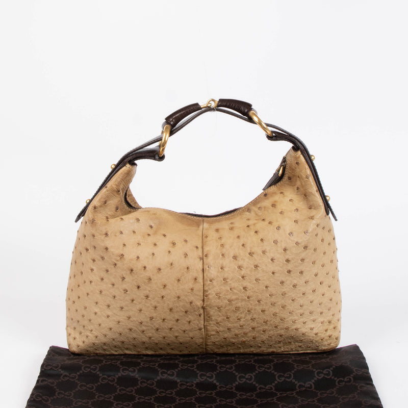 Shop this 100% authentic Gucci Beige Ostrich Small Horsebit Hobo Bag at Labellov.com.