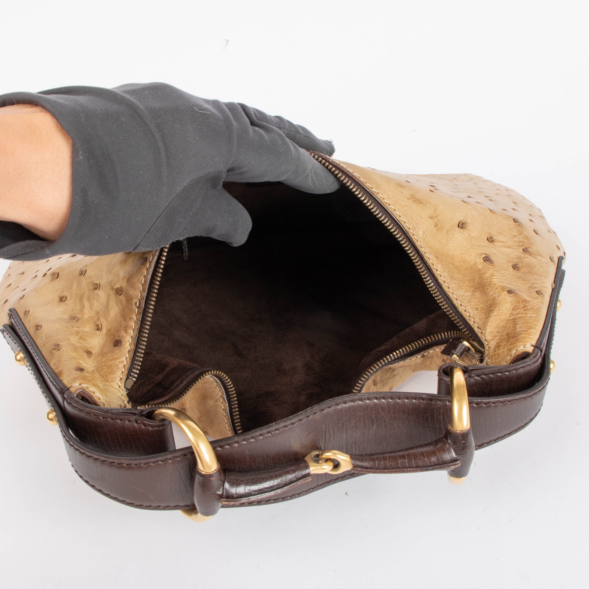 Shop this 100% authentic Gucci Beige Ostrich Small Horsebit Hobo Bag at Labellov.com.