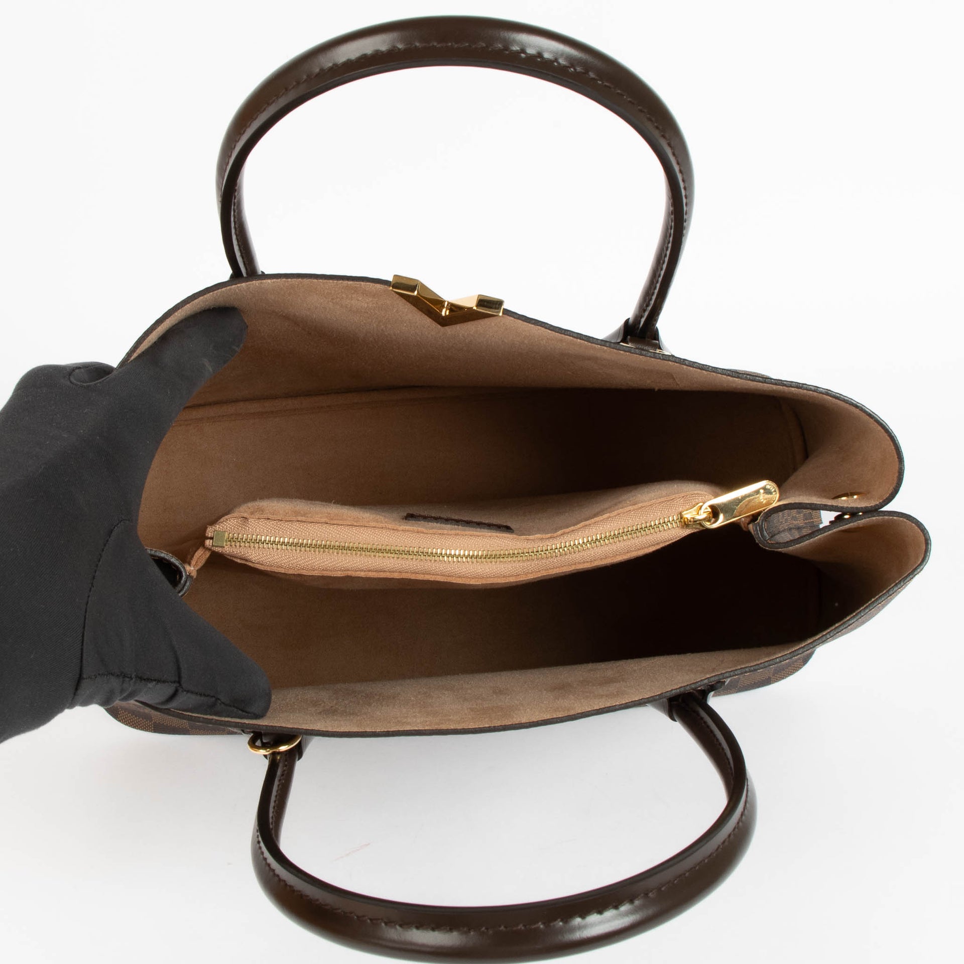 Shop the authentic Louis Vuitton Damier Ebene Kensington Top Handle Bag second hand on Labellov.com