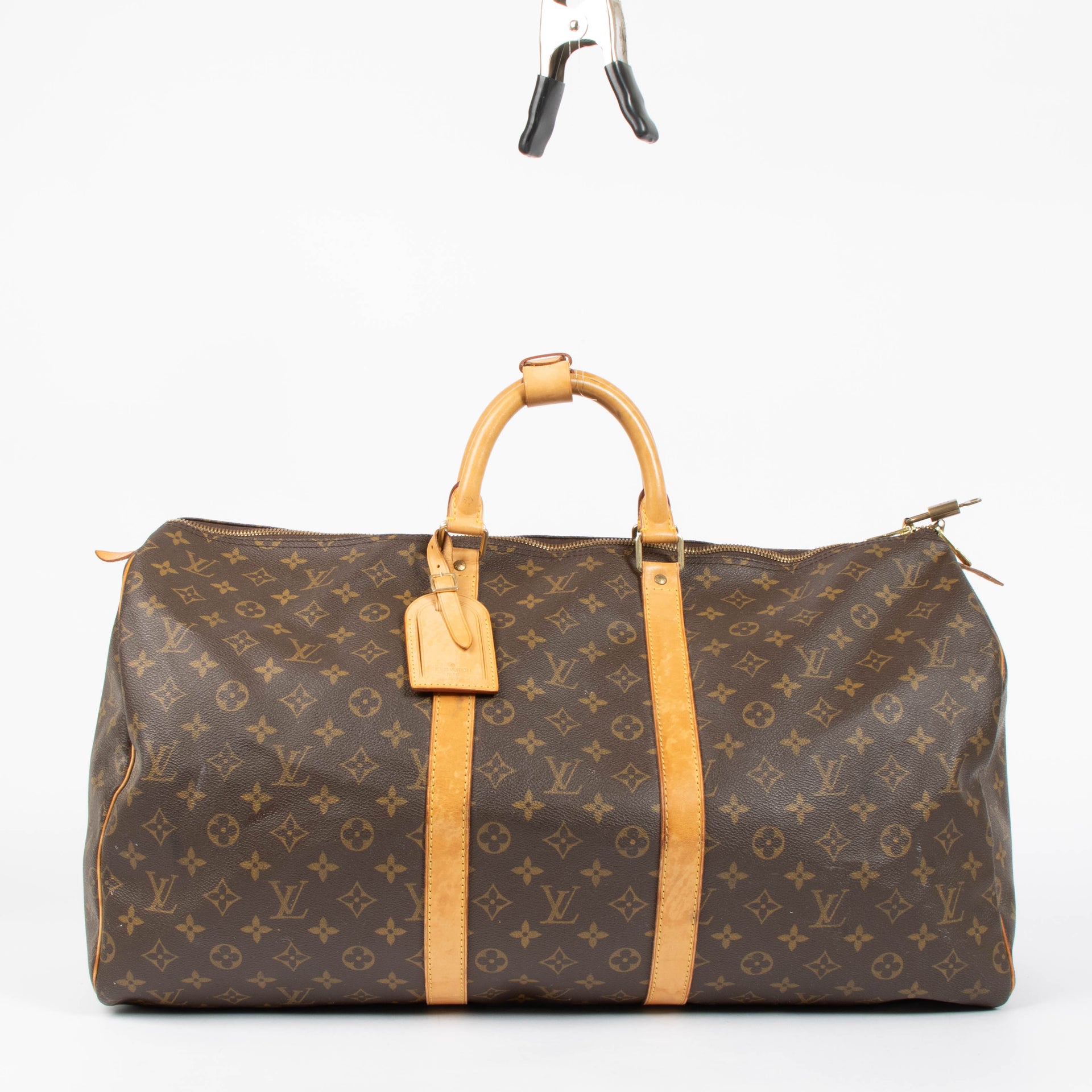 Shop this authentic louis vuitton monogram Keepall 55  pre-loved on Labellov.com