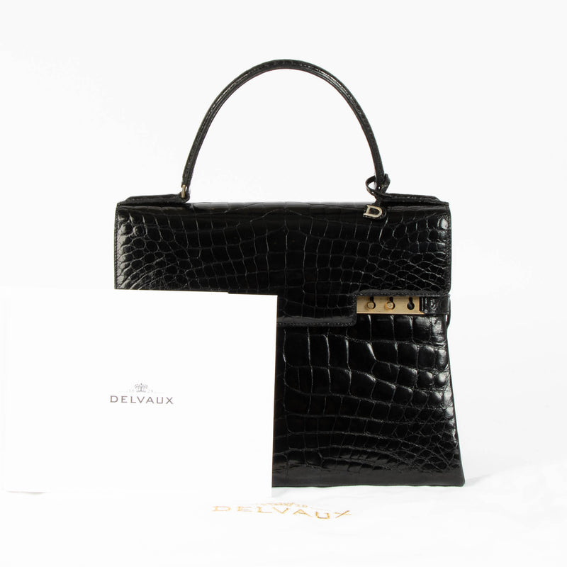 Shop this 100% authentic Delvaux 1960s Black Crocodile Tempête GM Bag at Labellov.com