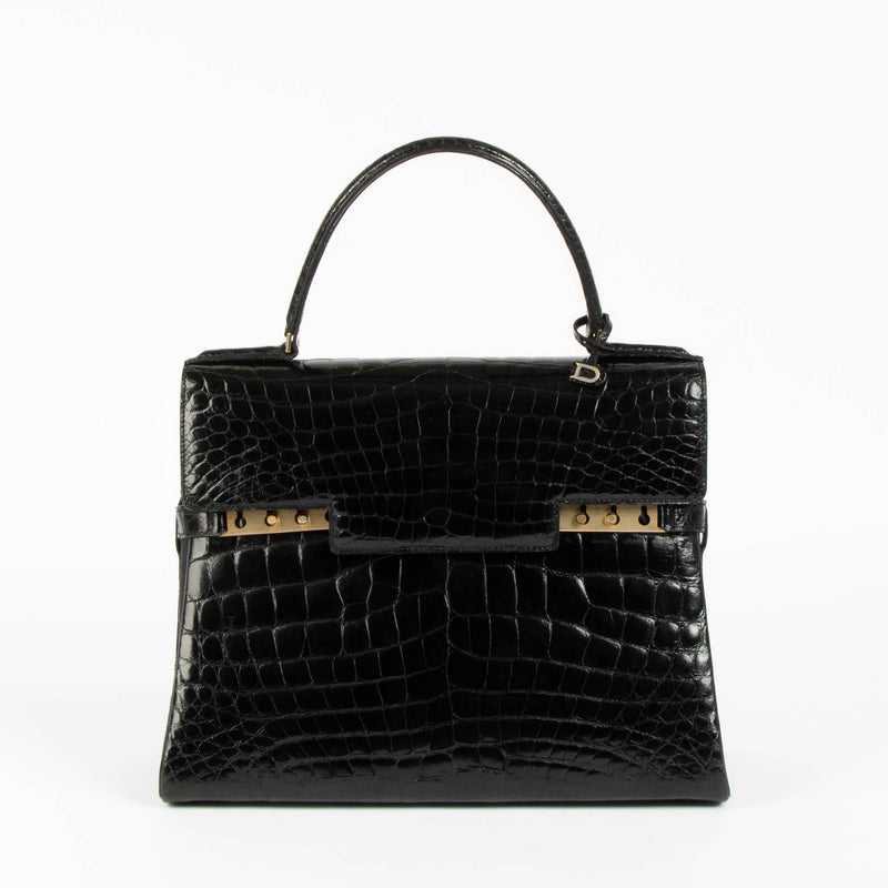 Shop this 100% authentic Delvaux 1960s Black Crocodile Tempête GM Bag at Labellov.com