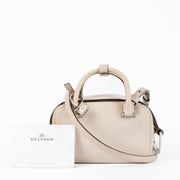 hop this 100% authentic Delvaux Taurillon Cool Box Nano Bag at Labellov.com