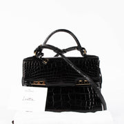 Shop this 100% authentic Delvaux Tempête Black Shiny Alligator Mini Bag at Labellov.com