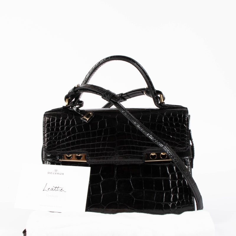 Shop this 100% authentic Delvaux Tempête Black Shiny Alligator Mini Bag at Labellov.com