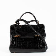 Shop this 100% authentic Delvaux Tempête Black Shiny Alligator Mini Bag at Labellov.com