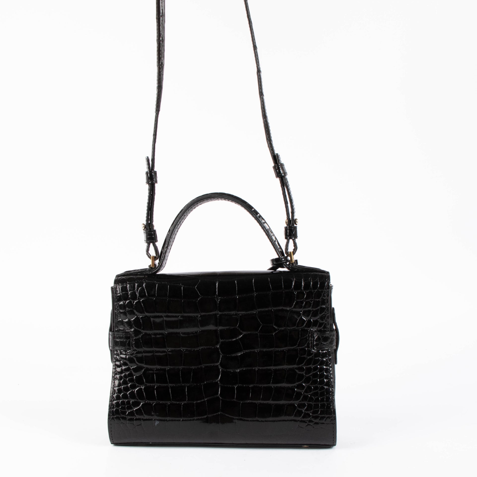 Shop this 100% authentic Delvaux Tempête Black Shiny Alligator Mini Bag at Labellov.com