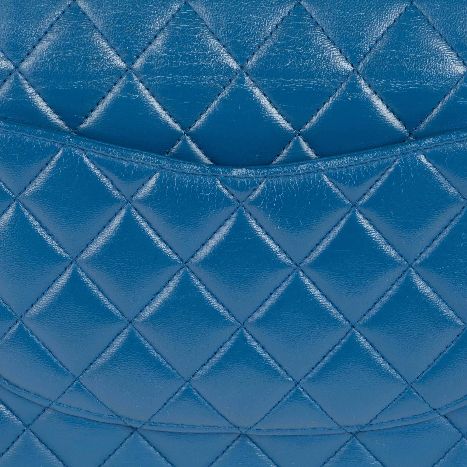 Shop this 100% authentic Chanel Blue Medium Classic Flap Bag at Labellov.com