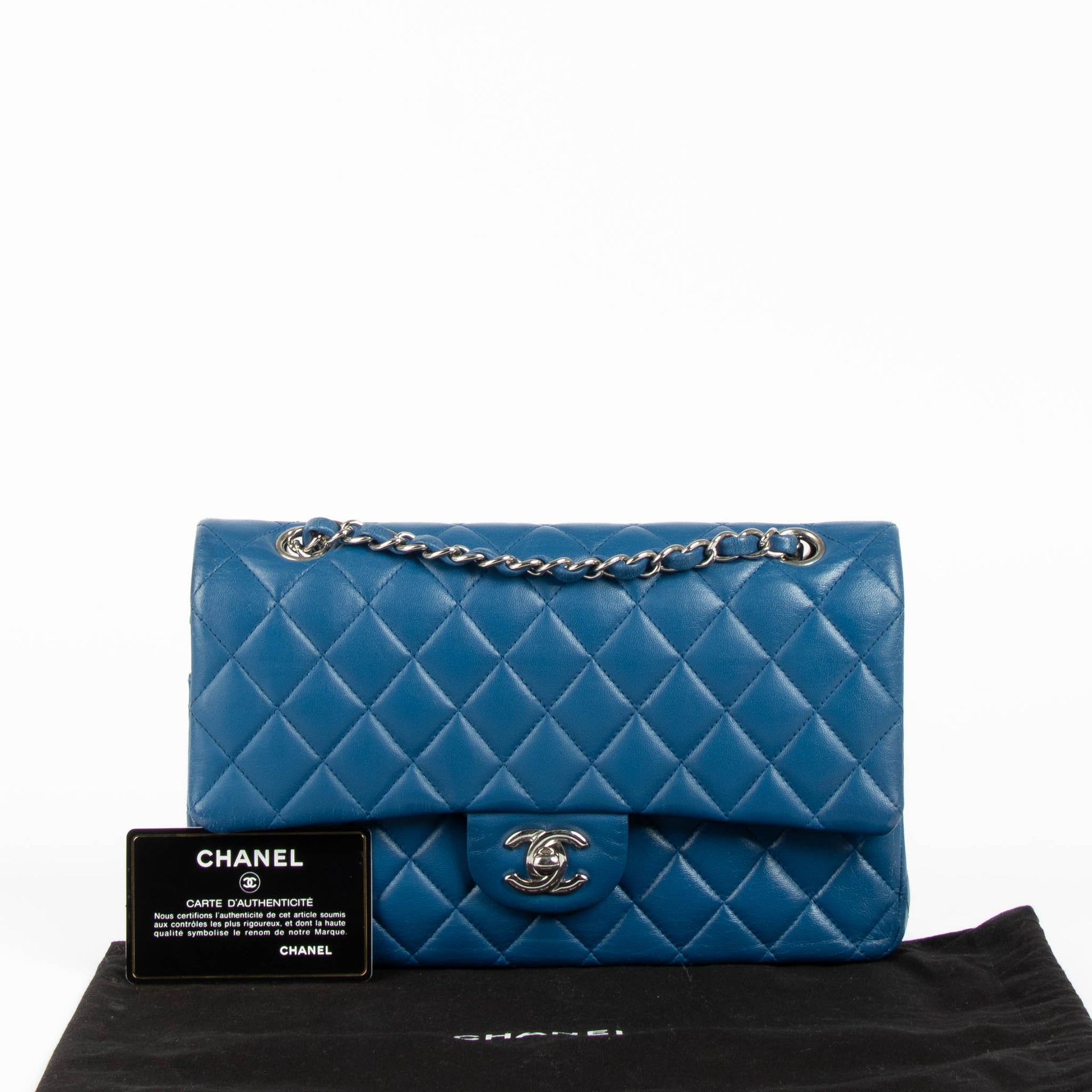 Shop this 100% authentic Chanel Blue Medium Classic Flap Bag at Labellov.com