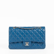 Shop this 100% authentic Chanel Blue Medium Classic Flap Bag at Labellov.com