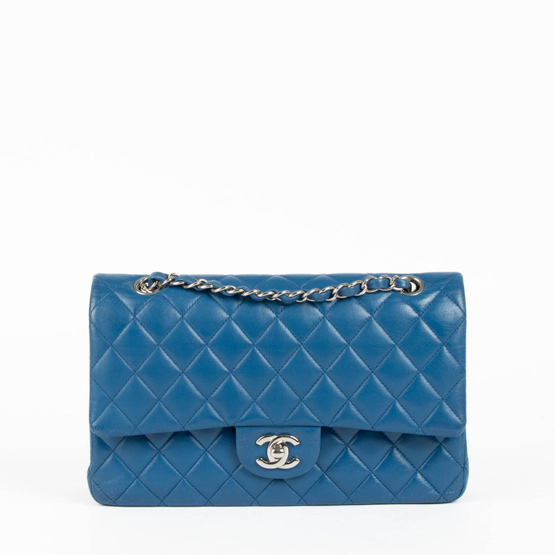 Shop this 100% authentic Chanel Blue Medium Classic Flap Bag at Labellov.com