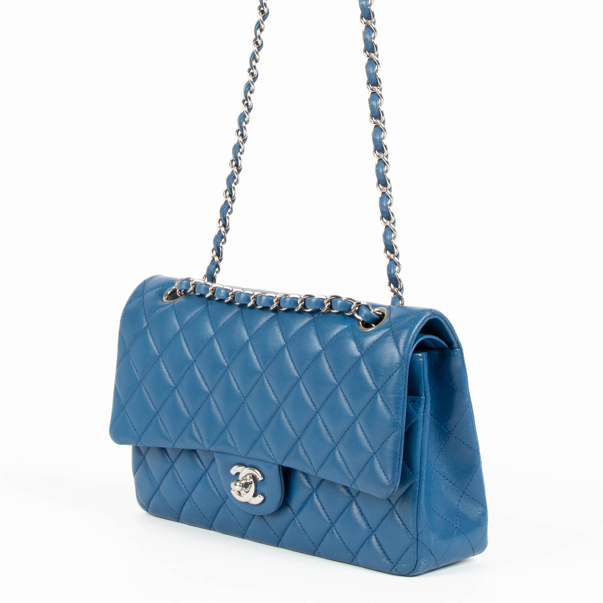 Shop this 100% authentic Chanel Blue Medium Classic Flap Bag at Labellov.com