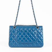 Shop this 100% authentic Chanel Blue Medium Classic Flap Bag at Labellov.com