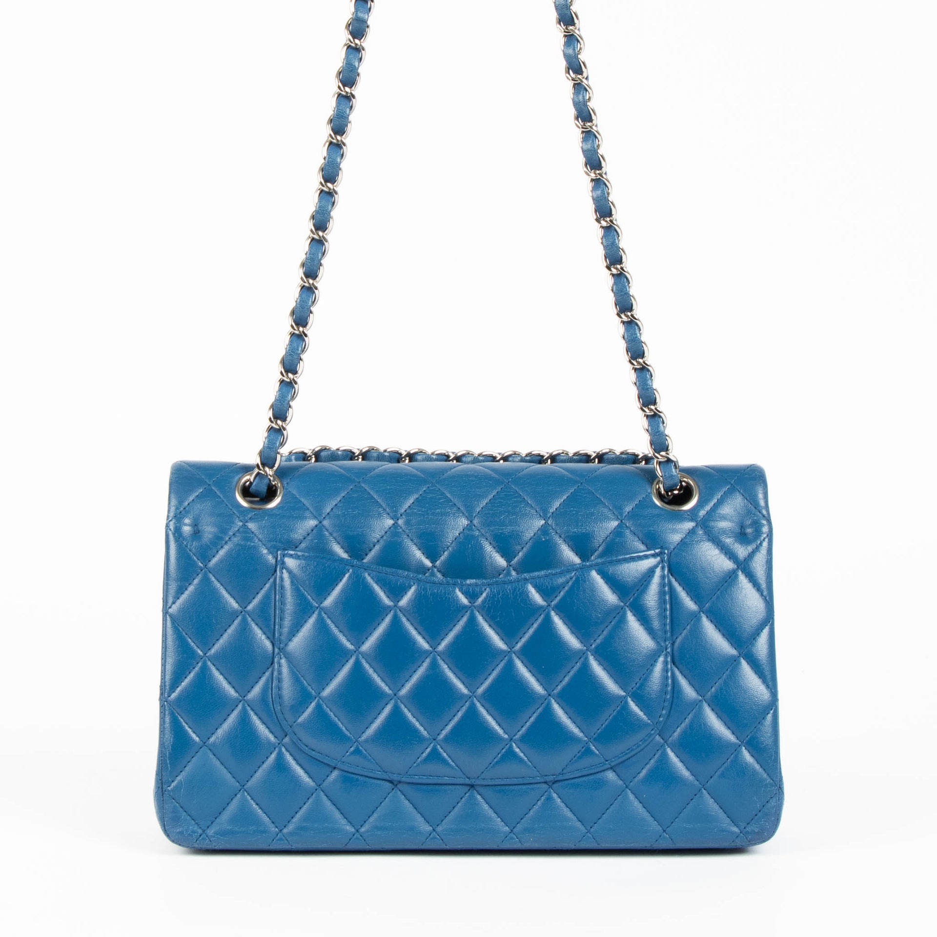 Shop this 100% authentic Chanel Blue Medium Classic Flap Bag at Labellov.com