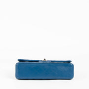 Shop this 100% authentic Chanel Blue Medium Classic Flap Bag at Labellov.com