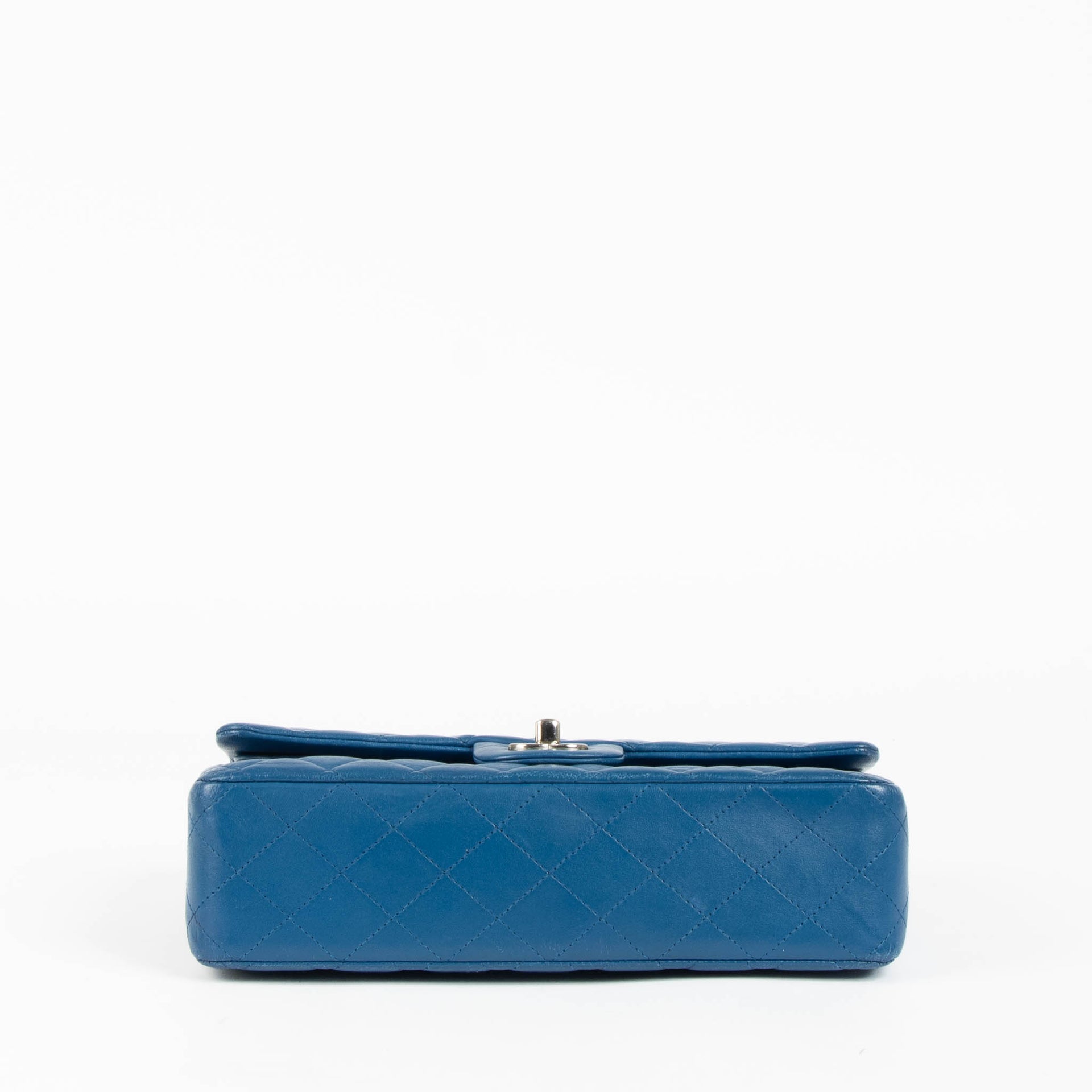 Shop this 100% authentic Chanel Blue Medium Classic Flap Bag at Labellov.com