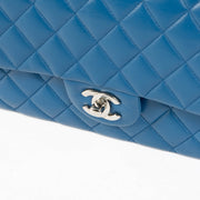 Shop this 100% authentic Chanel Blue Medium Classic Flap Bag at Labellov.com