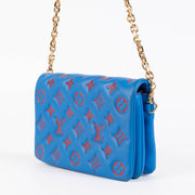 Shop this 100% authentic Louis Vuitton Blue x Red Pochette Coussin Bag at Labellov.com