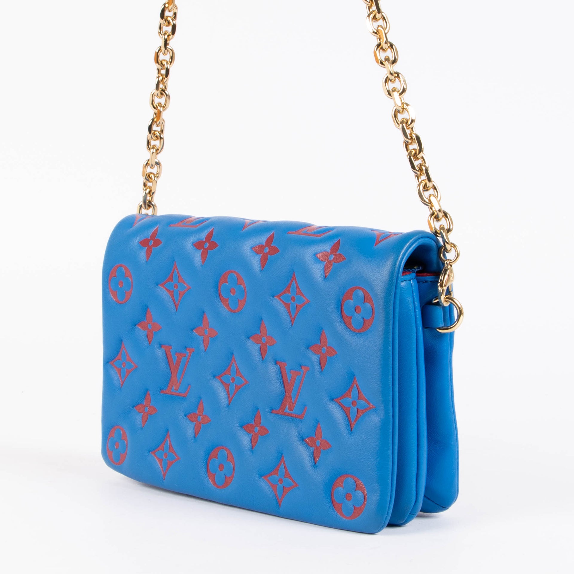 Shop this 100% authentic Louis Vuitton Blue x Red Pochette Coussin Bag at Labellov.com