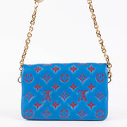 Shop this 100% authentic Louis Vuitton Blue x Red Pochette Coussin Bag at Labellov.com