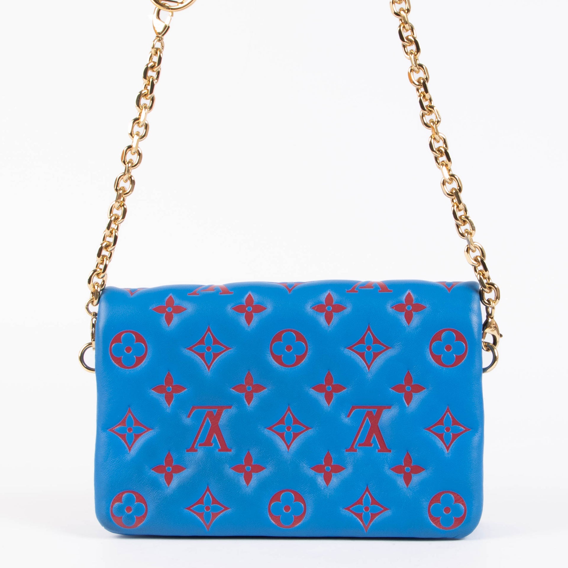 Shop this 100% authentic Louis Vuitton Blue x Red Pochette Coussin Bag at Labellov.com