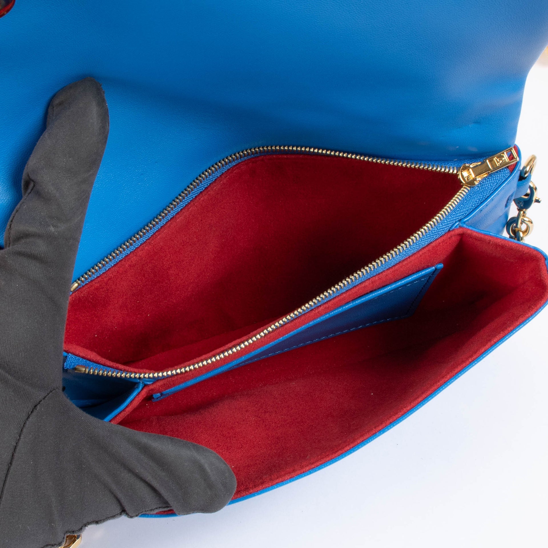 Shop this 100% authentic Louis Vuitton Blue x Red Pochette Coussin Bag at Labellov.com