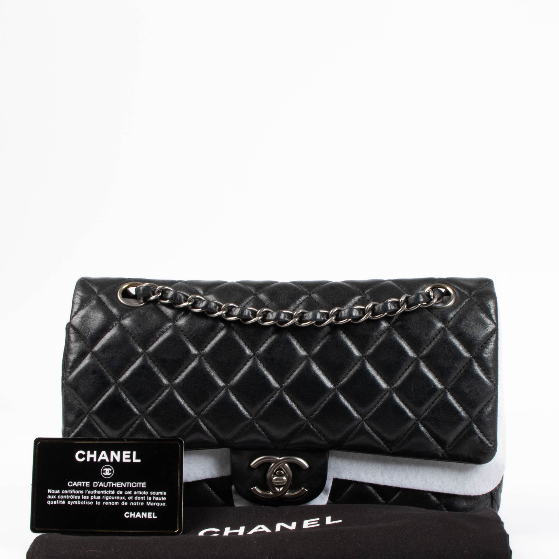 Shop the authentic Chanel Black Medium Lambskin Flap Bag RHW second hand on Labellov.com