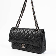 Shop the authentic Chanel Black Medium Lambskin Flap Bag RHW second hand on Labellov.com