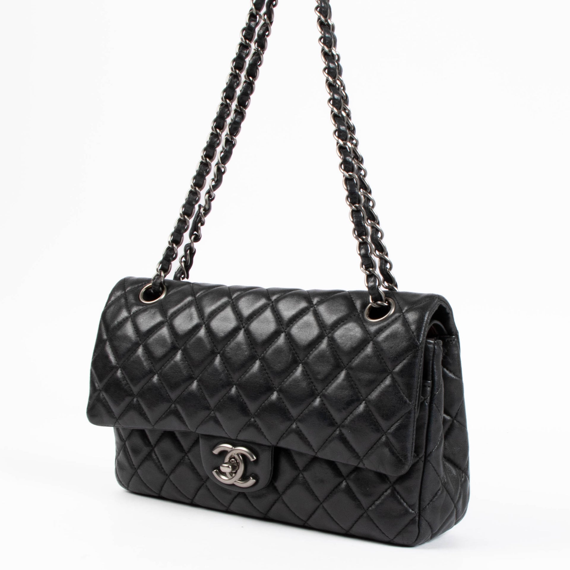 Shop the authentic Chanel Black Medium Lambskin Flap Bag RHW second hand on Labellov.com
