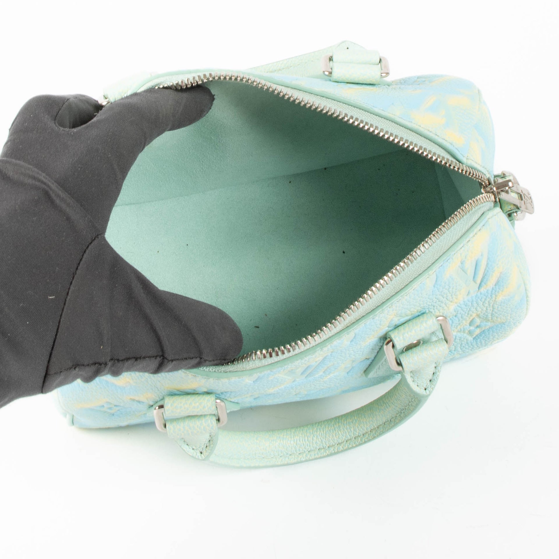 Shop this 100% authentic Louis Vuitton Speedy 20 Empreinte Stardust at Labellov.com