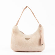 Shop this 100% authentic Prada Pink Re-Edition 2000 Shearling Bag at Labellov.com