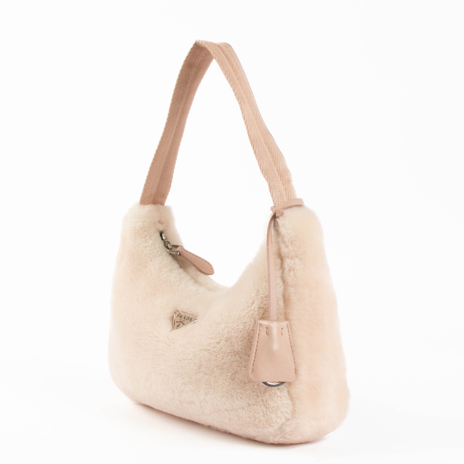 Shop this 100% authentic Prada Pink Re-Edition 2000 Shearling Bag at Labellov.com