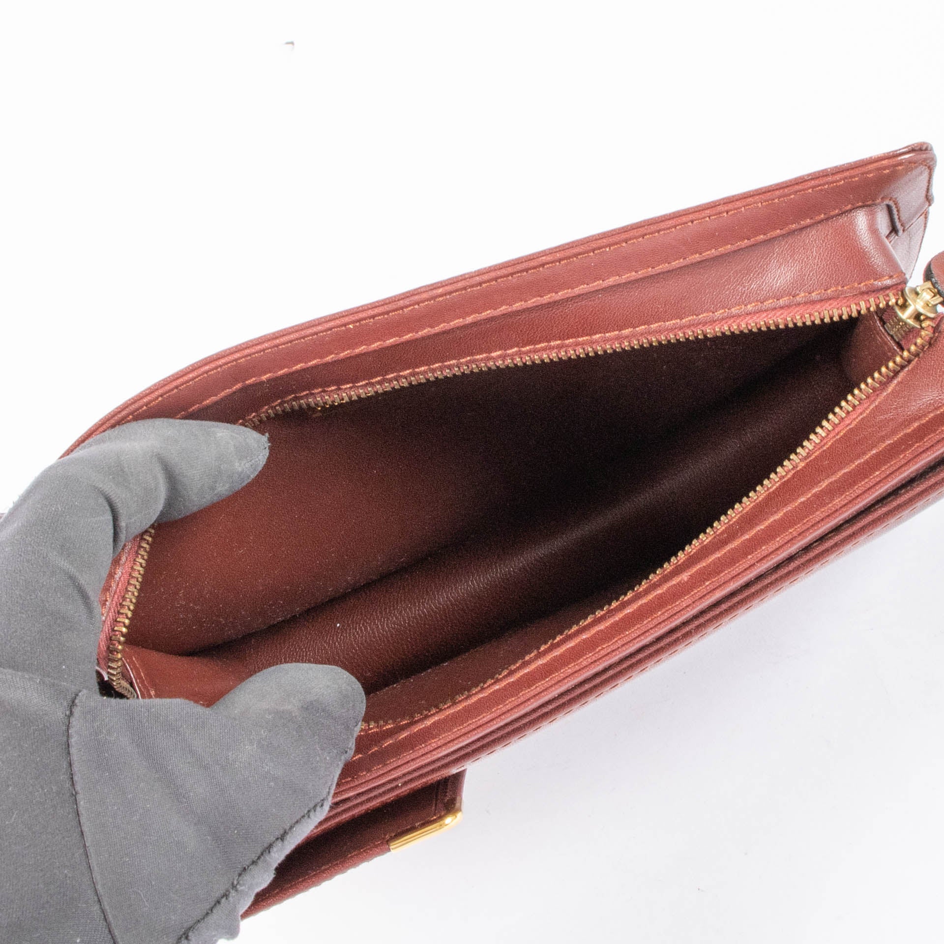 Pochette vintage en cuir bordeaux Cartier