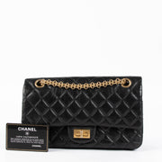 Shop this authentic Chanel Black Aged Calfskin Medium 2.55 Reissue Bag pre-loved on Labellov.com 