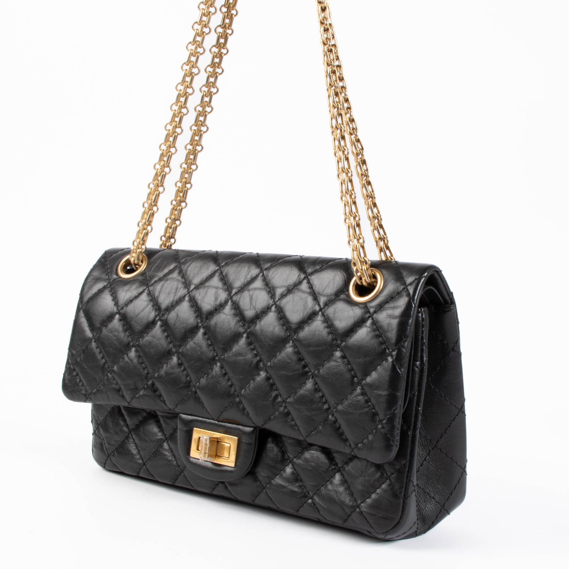 Shop this authentic Chanel Black Aged Calfskin Medium 2.55 Reissue Bag pre-loved on Labellov.com 