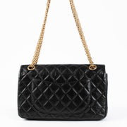 Shop this authentic Chanel Black Aged Calfskin Medium 2.55 Reissue Bag pre-loved on Labellov.com 