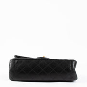 Shop this authentic Chanel Black Aged Calfskin Medium 2.55 Reissue Bag pre-loved on Labellov.com 