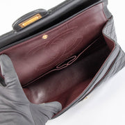 Shop this authentic Chanel Black Aged Calfskin Medium 2.55 Reissue Bag pre-loved on Labellov.com 