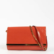 Shop this Louis Vuitton Orange Sunset Monogram Vernis Ana Clutch pre-loved on Labellov.com