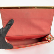 Shop this Louis Vuitton Orange Sunset Monogram Vernis Ana Clutch pre-loved on Labellov.com