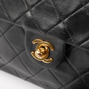 Shop this 100% authentic Chanel Vintage Black Lambskin Small Flap Bag at Labellov.com