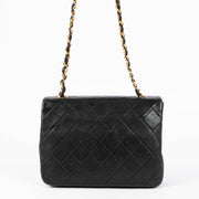 Shop this 100% authentic Chanel Vintage Black Lambskin Small Flap Bag at Labellov.com