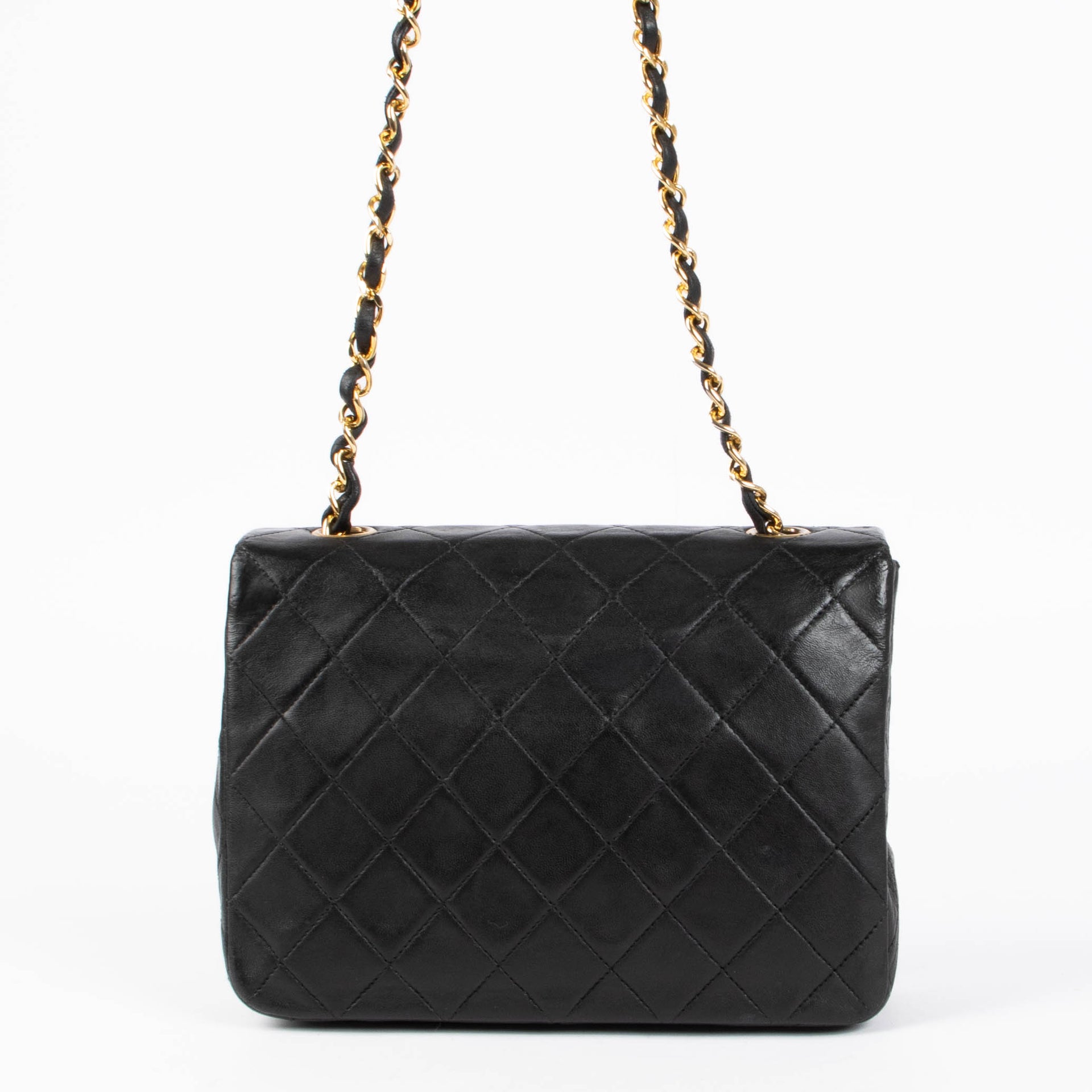 Shop this 100% authentic Chanel Vintage Black Lambskin Small Flap Bag at Labellov.com