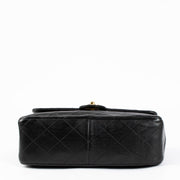 Shop this 100% authentic Chanel Vintage Black Lambskin Small Flap Bag at Labellov.com
