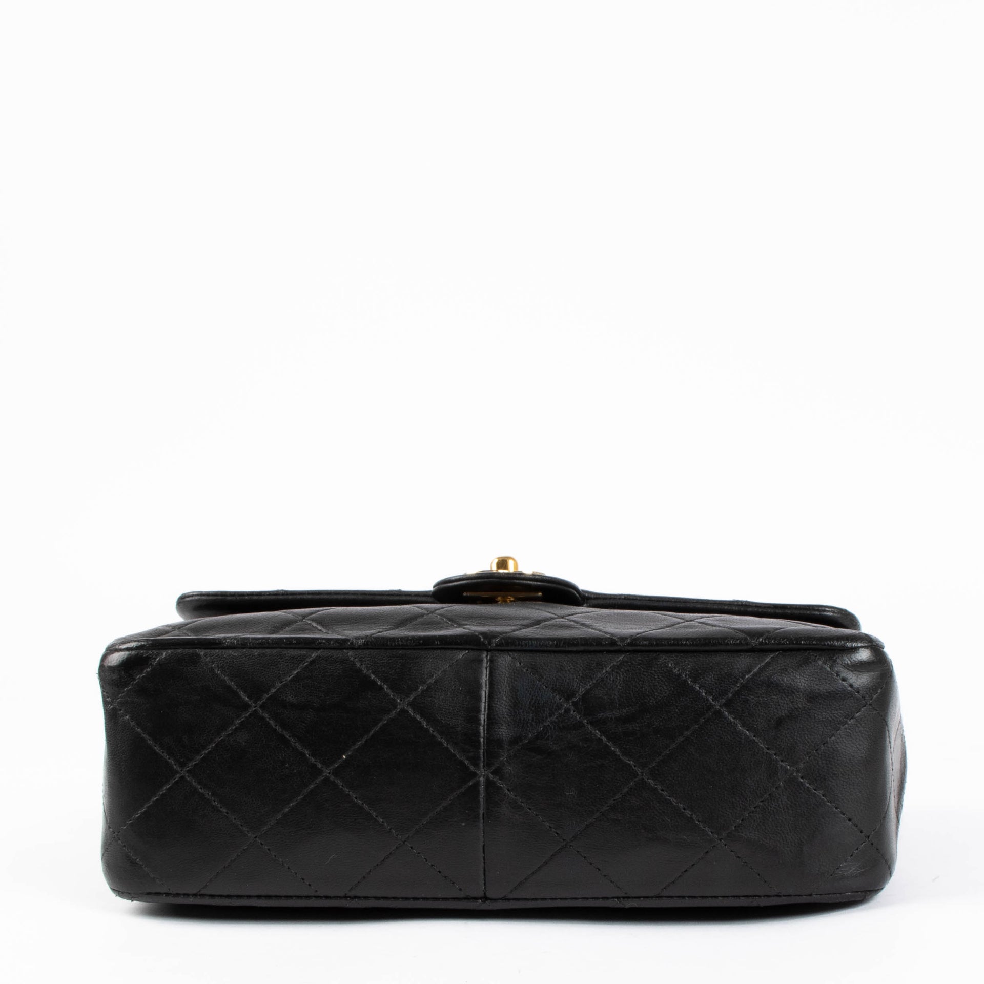 Shop this 100% authentic Chanel Vintage Black Lambskin Small Flap Bag at Labellov.com