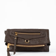 Shop the authentic Louis Vuitton Terre Mongoram Empreinte Petillante Clutch second hand on Labellov.com