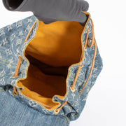 Shop the authentic Louis Vuitton Blue Monogram Denim Sac A Dos GM second hand on Labellov.com